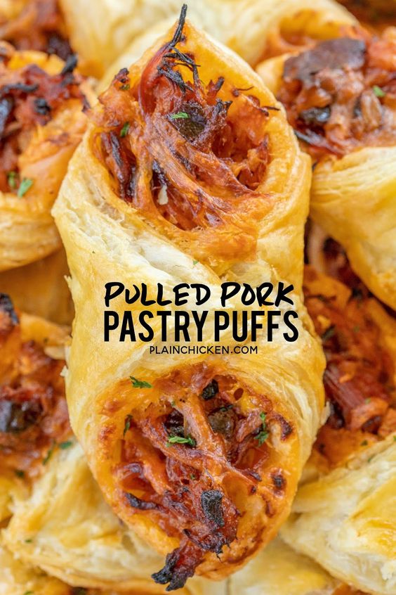 Pulled Pork Pastry Puffs - Only 4 ingredients! Great recipe for a quick lunch, dinner or party. Smoky pulled pork tossed with BBQ sauce and cheese then baked in puff pastry. SO good!