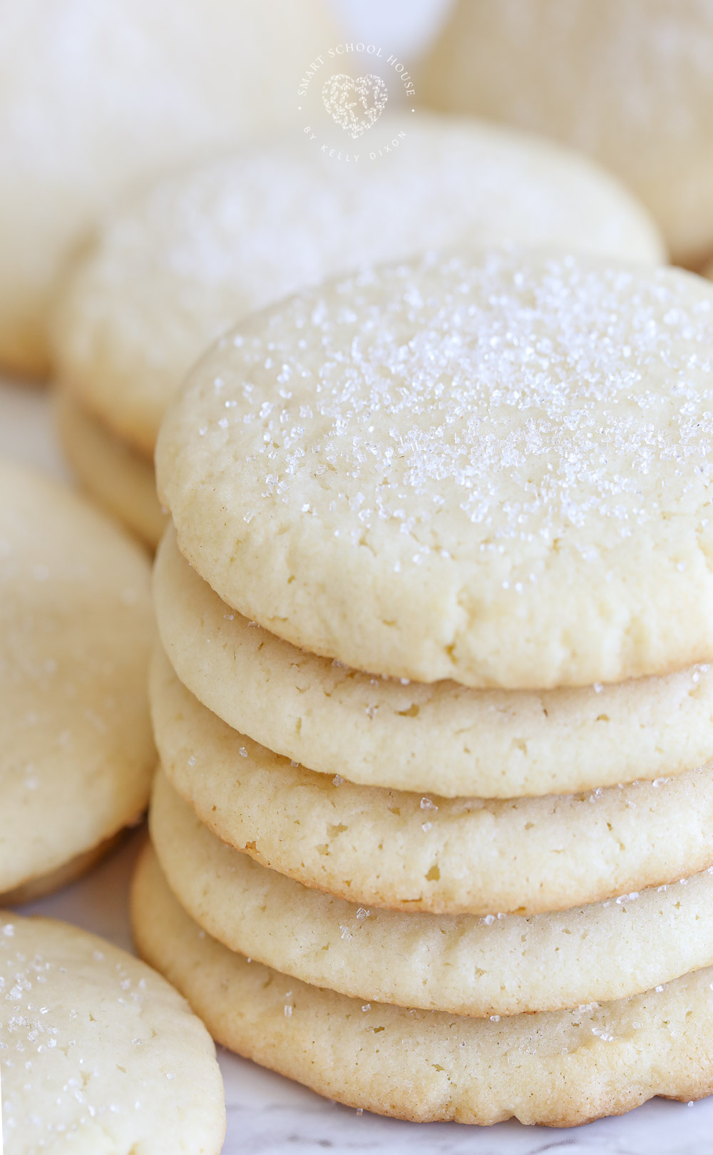 The BEST Sugar Cookies Ever! With crisp edges, thick and soft centers, they melt in your mouth!