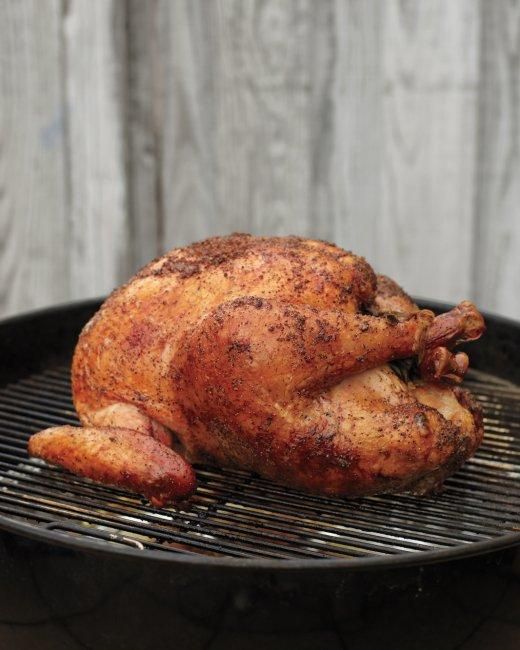 Slow Grilled BBQ Turkey - Save precious oven space this Thanksgiving by roasting your turkey over charcoal instead. Check out our step-by-step photo tutorial.