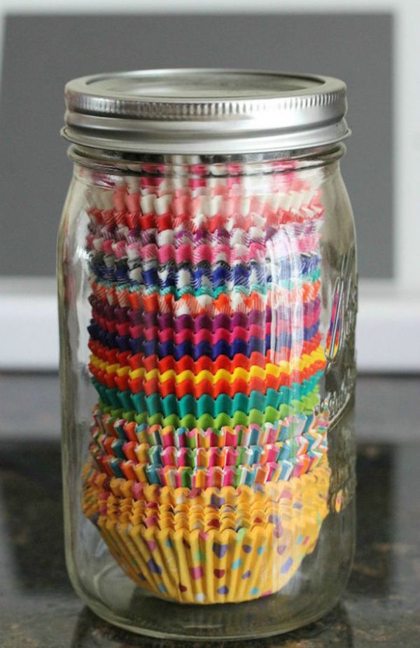 I've actually done this! It is SUCH a cute decoration and it's effective! Use a clear mason jar to organize various cupcake liners plus 13 Gorgeous Tidy Tips and Organization Hacks