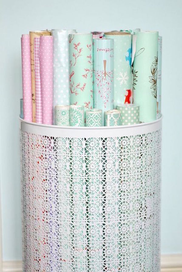 This is so smart! Use a decorative laundry basket to store wrapping paper plus 13 Gorgeous Tidy Tips and Organization Hacks