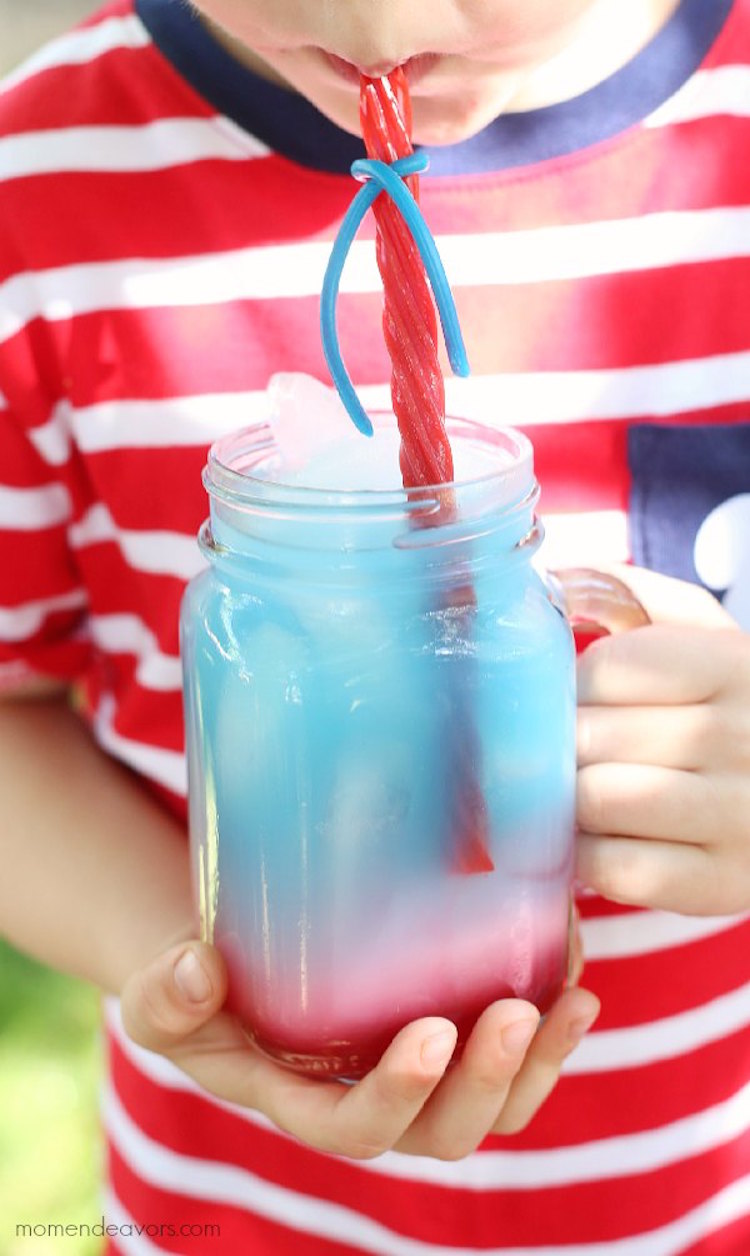 Red, White, and Blue punch with a Twizzlers straw. My kids are going to love this 4th of July treat!