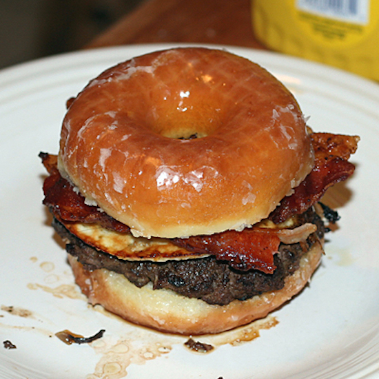 It might be one of the fattiest recipes in the world, but I'd take a few bites of a Krispy Kreme Donut Hamburger if I could!