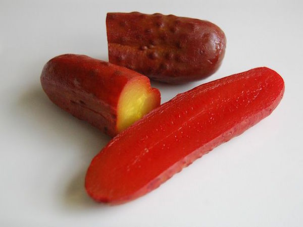 These are called Koolickles (Kool-Aid pickles) and I hear they are a down-home Mississippi Delta delicacy. In this case, you use whole dill pickles and Kool-Aid and sugar. That's it.