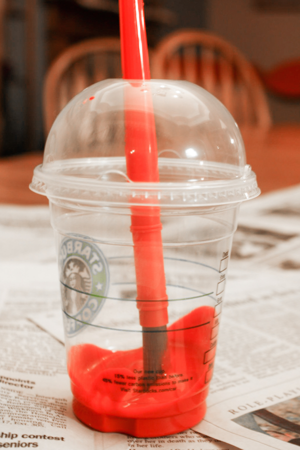 DIY no-spill paint cup made by repurposing an empty Starbucks cup. So smart! No need to buy pricey paint accessories for the classroom or at home. 
