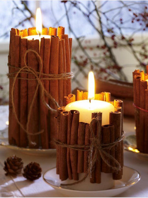 Tie cinnamon sticks around your candles. The heated cinnamon makes your house smell amazing!!