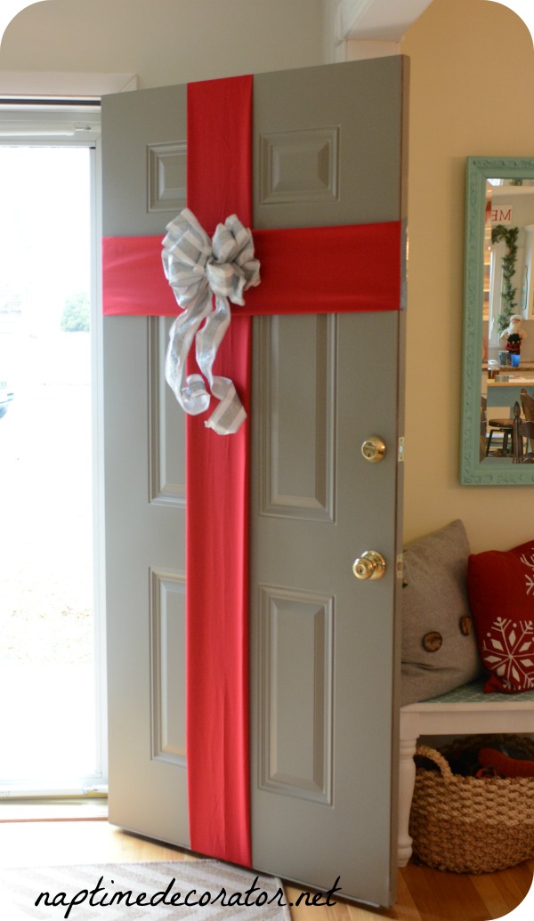 DIY Gift wrapped door - For all of the minimalists who don't want to have to try too hard while decorating, this one's for you. 