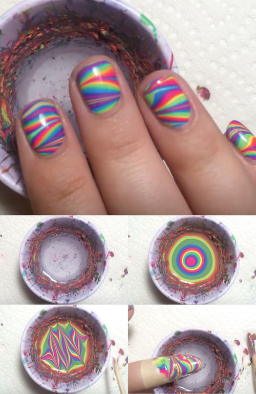 This is called Water Marbling and just watch how easily she creates this fun Rainbow Manicure with nail polish, water, and tape. Incredible nail art tutorial! 