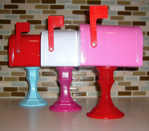 Valentine Mailboxes made with small mailboxes and painted candlesticks all from the $1 store! How smart!