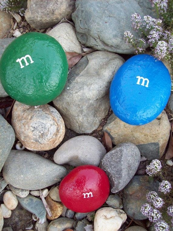Paint round rocks to make them look like huge M&M's outside of your house - cute!