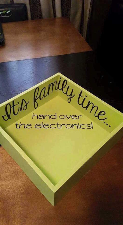 This is a neat idea for families with older children. Use a wooden box and turn it into an electronics collecting station so that everybody participates in dedicated "family time". 