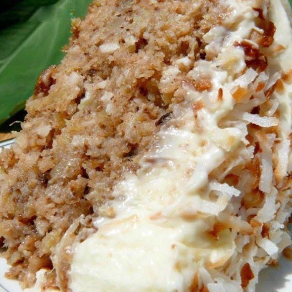 Hawaiian Wedding Cake with Whipped Cream Cheese Frosting - no need to wait for a wedding to make this delicious pineapple, coconut, walnut, cinnamon and sugar cake that will have you going back for seconds, maybe thirds!