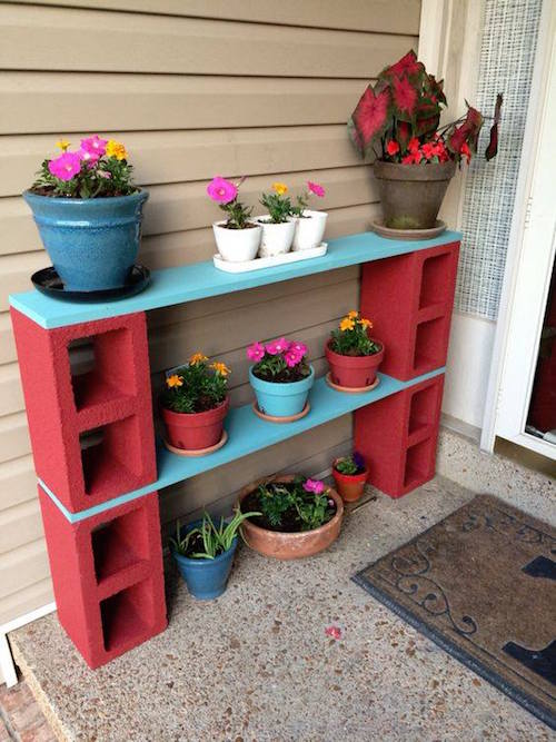 Make a simple and inexpensive porch plant table with cinder blocks!