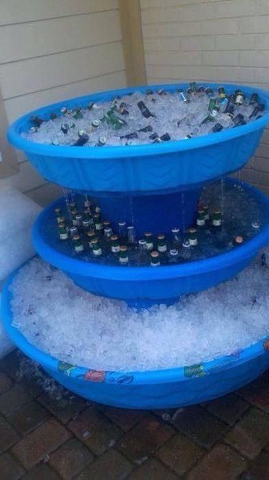 Ice beverage fountain made with buckets and plastic pools. Great idea for summer parties & BBQs! 