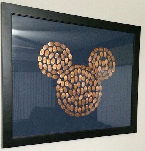 You know how Disneyland and Disney World have a bunch of those pressed penny machines? They're so fun to use! However, I've always lost my Disney pressed pennies shortly after our visit. Isn't framing your pressed pennies in a Mickey shape the greatest idea? I'm sure you could make one with less pennies too. 
