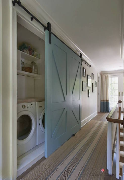 Remove the regular doors that are covering your laundry closet with gorgeous sliding barn doors! Great idea - 
