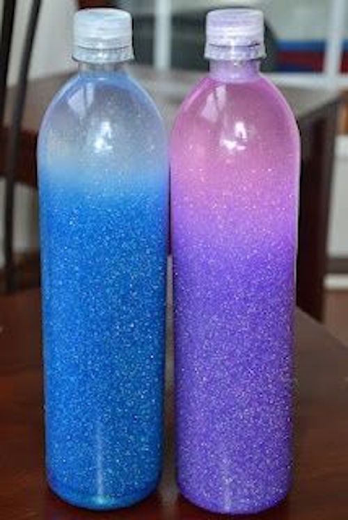 Glitter bottles - fill them with water, fine glitter, and glue! So mesmerizing ... 