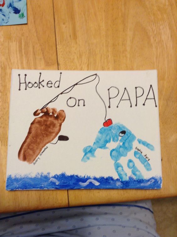 DIY handprint art for Father's Day. Hooked on Papa - cute!