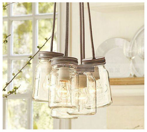 Hanging mason jar chandeliers can be used in the kitchen, over a dining table, in an office, or even in an entry way.