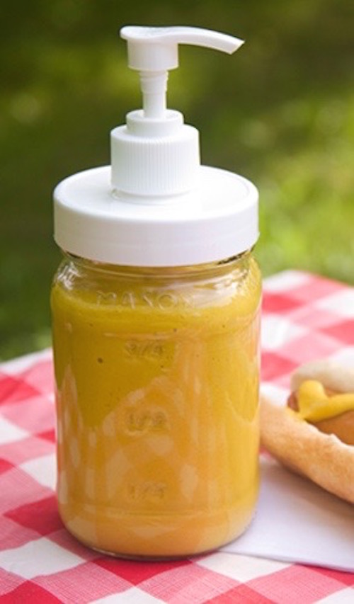 Put Condiments in neat Mason jars. Love this idea for a backyard BBQ party. 