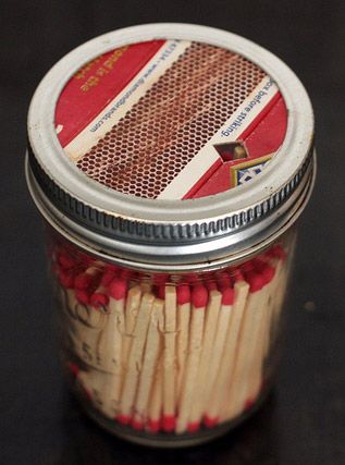 Mason Jar Match Dispenser keeps all the matches from coming out of the box . This is a neat DIY gift idea too. 