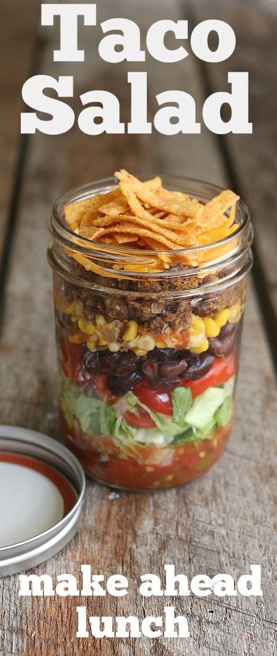 Taco Salad in a Jar -- This quick and easy lunch recipe is not only delicious, it's packed with healthy food! Layers of lettuce, tomatoes, beans and more!