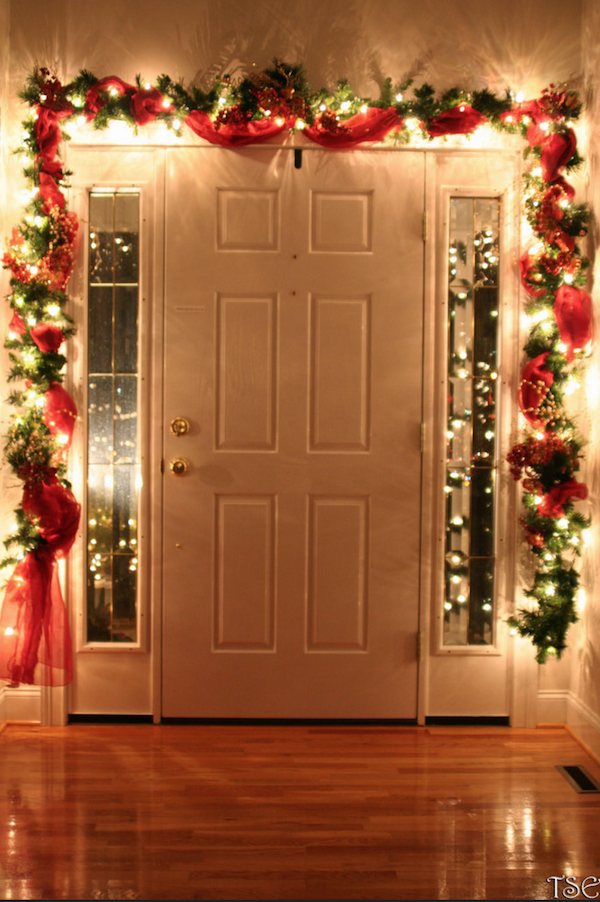 Don’t forget to decorate the inside of your front door! Many people put garland around the outside, but why not add a bit of zest to the inside as well? Now you can remind people of the holiday spirit as they come and go!
