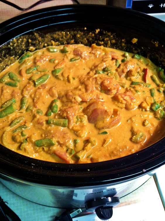 Saucy coconut curry chicken made right in your crock pot! 
