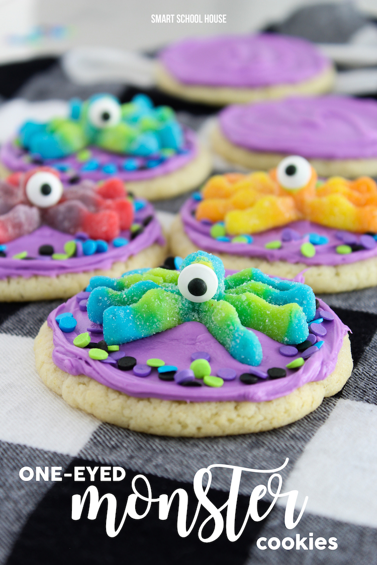 One-Eyed Monster Cookies. 3 ingredient cookies topped with colorful frosting, candy eyes, and monster gummies. Easy cookies to make for Halloween or party. 