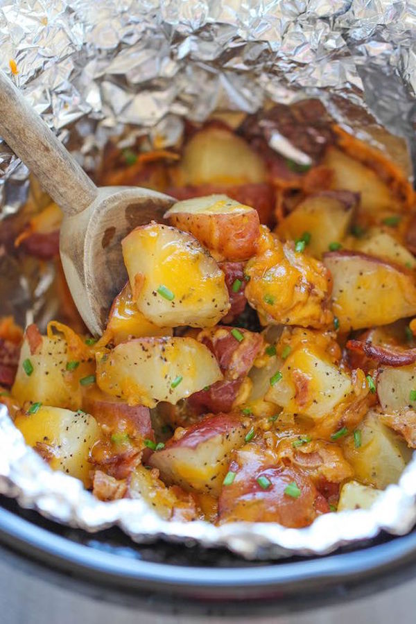 Slow Cooker Cheesy Bacon Ranch Potatoes - The easiest potatoes you can make right in the crockpot - perfectly tender, flavorful and cheesy!
