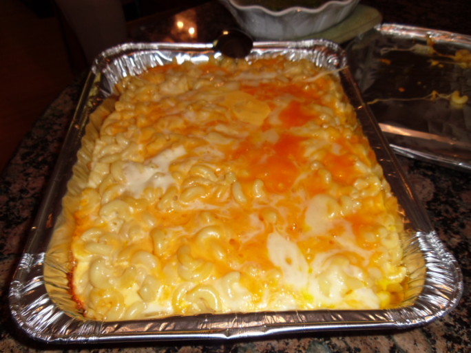 Macaroni and cheese recipe for a crowd: One reader said, "This is the best macaroni and cheese I have ever tasted!" Made of ooey gooey mild cheese, jack cheese, sharp cheese, muenster cheese, velveeta cheese, and half &half.
