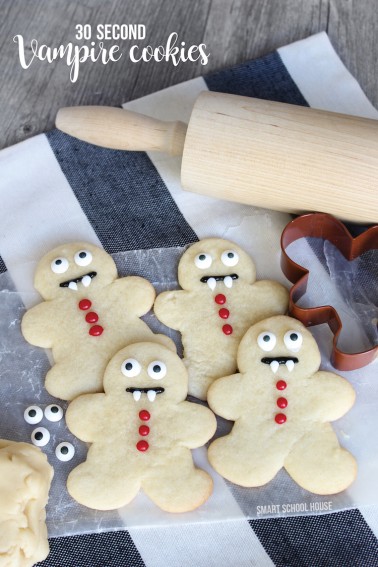 How to make Vampire Cookies in 30 seconds for Halloween! Use a gingerbread man cookie cutter... SO SMART and they look perfect every time.