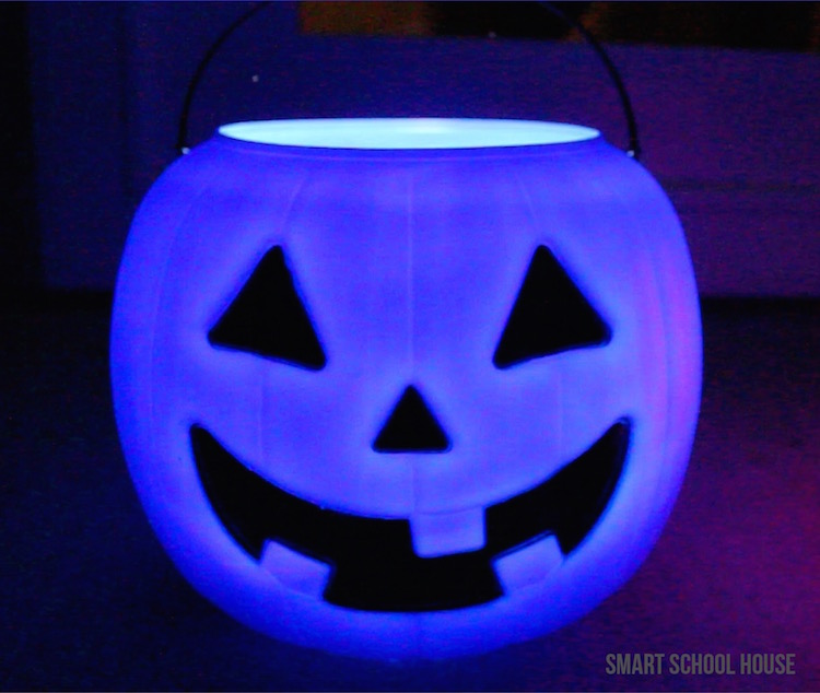 Glowing Pumpkin Pails - Decorate for Halloween in 30 seconds by setting out these glowing pumpkin pails! I got the colorful pumpkins for one dollar!