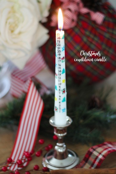 How to make a DIY Christmas Countdown Candle for the holidays! Transfer any design you create (or print ours out) and easily transfer it to a candle without any special tools. It's as simple as 1-2-3! An ADORABLE Christmas tradition idea and craft.
