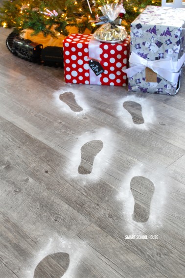 Santa Footprints - how to make Santa's footprints using baking soda for Christmas. ADORABLE! It takes seconds to do and just a minute to clean up.