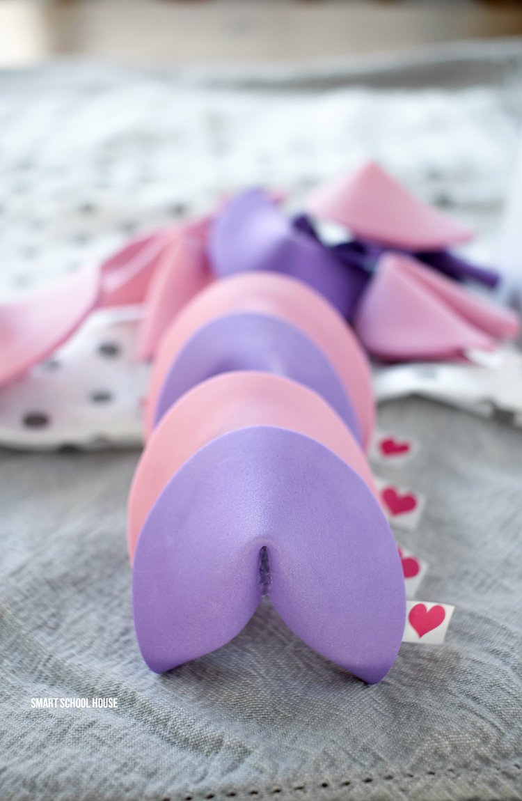 How to Make Valentine Fortune Cookies - DIY pink and purple fortune cookies for Valentine's Day! An easy candy free and non-food Valentine idea. 