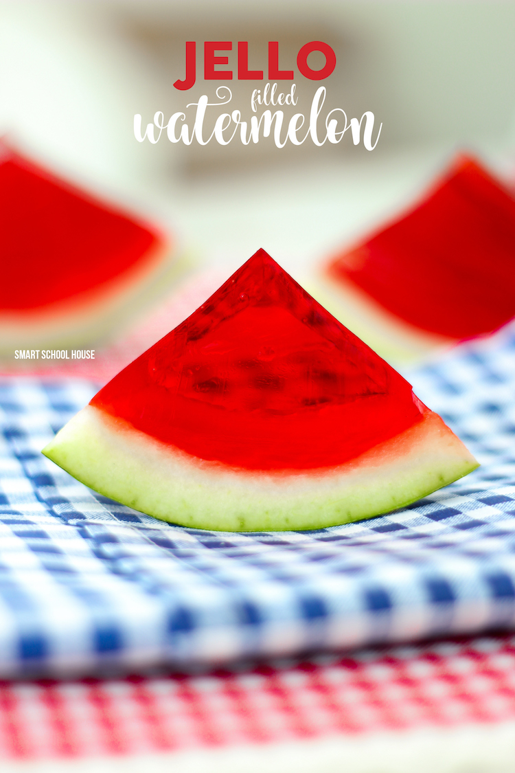 Jello Filled Watermelon - slice up some fun with this DIY watermelon jello recipe! Every kid loves biting into a slice of jello watermelon on a sunny day.