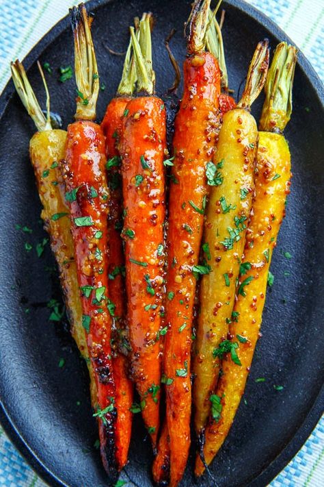 Sweet and tender roasted carrots in a tasty maple dijon glaze.