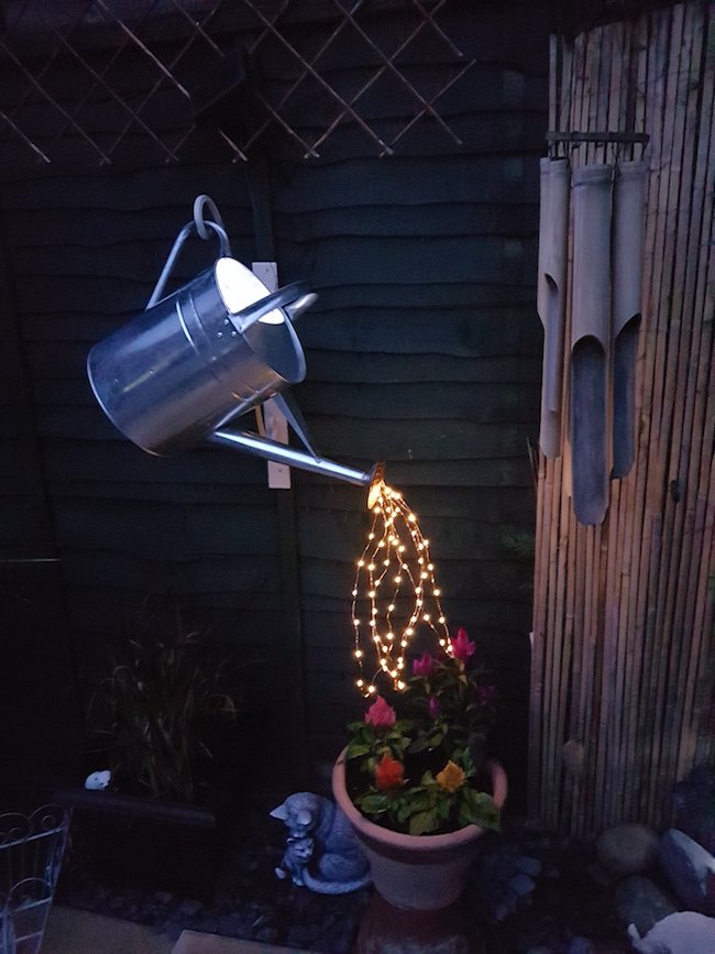 Watering can with lights