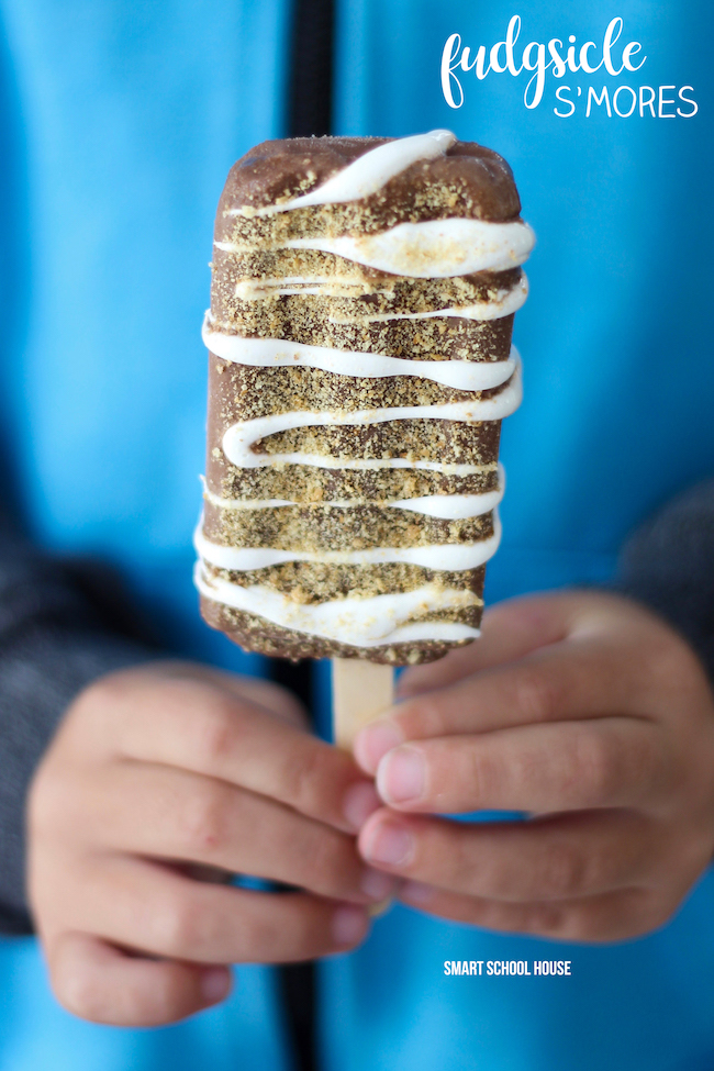 Fudgsicle S'mores - FROZEN S'MORES! Fudgsicles mixed with s'mores are such a tasty, quick, and easy cold treat for summer. Perfect for cooling off and curing your chocolate cravings this summer. 