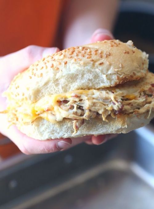 Slow Cooker Crack Chicken - This Slow Cooker Crack Chicken is creamy cheesy ranch and bacon Shredded chicken. It's perfect on it's own, on a sandwich, in a tortilla or as a dip! Great for BBQ's or summer days/nights. You might also like the crock pot chicken caesar sandwiches on the previous slide too! 