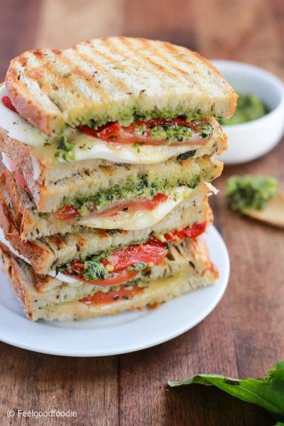 This Grilled Mozzarella Sandwich is made with fresh tomatoes and walnut pesto grilled with sourdough bread. It's easy to assemble and bursting with flavor!