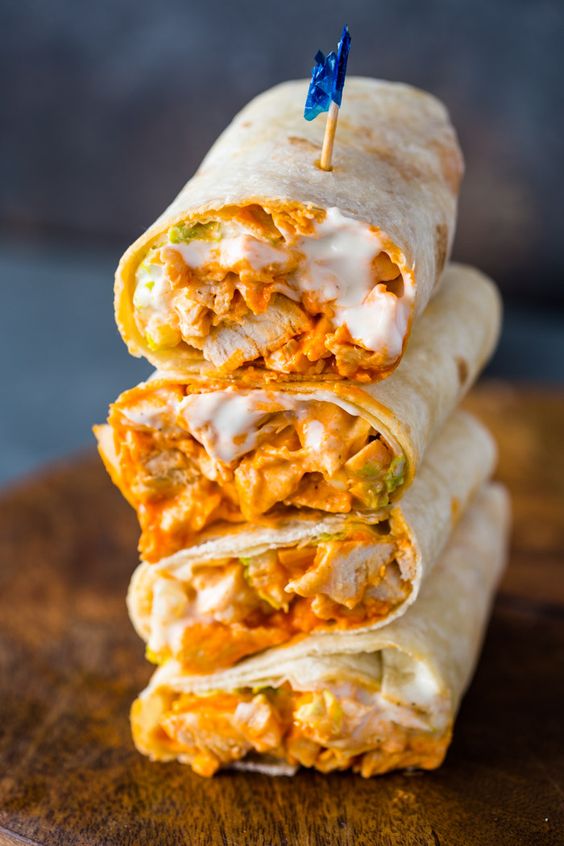 Spicy buffalo chicken wraps with ranch dressing are bursting with flavor and made in just 5 minutes!