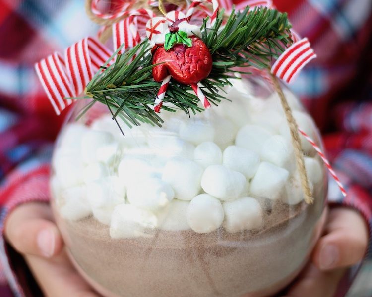 Ornament filled with Hot Chocolate - mix hot cocoa in a large plastic ornament then add mini marshmallows on top for a quick and easy DIY Christmas gift.