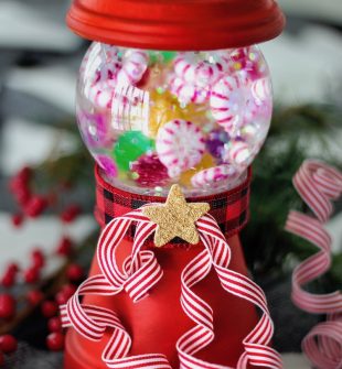 Snow Globe Gum Ball Machine - Make a wonderful glittery candy scene built with terra cotta clay pots and small candy ornaments!