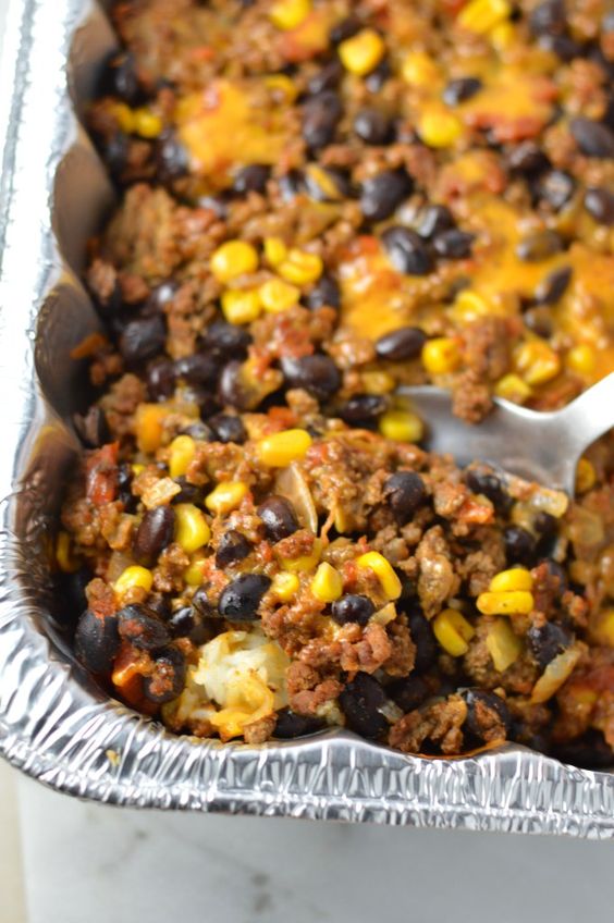 Easy Taco Rice Casserole Freezer Meal made with beans and ground beef. Great recipe to make ahead for the week as your weekly dinner meal prep.