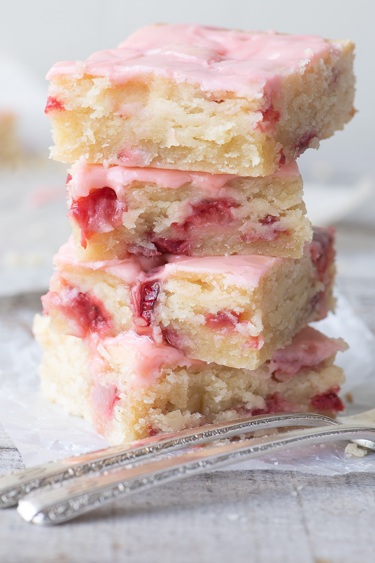 Strawberry Lemon Blondies Recipe ~ these easy strawberry blondies are moist and dense, (think soft shortbread) with plenty of little jammy pockets thanks to a cup of diced fresh strawberries in the batter. The hint of lemon revs up the berry flavor and gives these strawberry bars a bright, tangy vibe. 