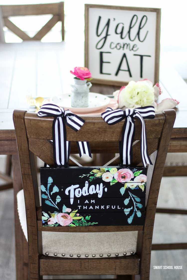 Y'all Come Eat sign with an adorable rustic place setting and hanging chair sign #farmhousedecor #farmhousekitchen #farmhouse table #yall #tablescape #hangingchairsign #homedecor #diyhome #easter #spring #brunchtable