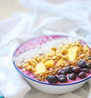 This Tropical Smoothie Bowl is ultra refreshing and delicious. The smoothie bowl is ideal breakfast or lunch and can even be a snack or dessert.