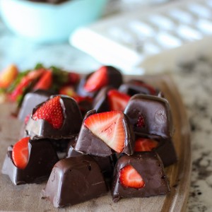 Chocolate Covered Strawberries in an Ice Cube Tray - These cost less than $5 to make! Perfect for entertaining or a night in.